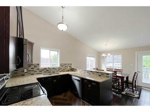 180 Bussieres Drive, Fort Mcmurray, AB - Indoor Photo Showing Kitchen With Double Sink