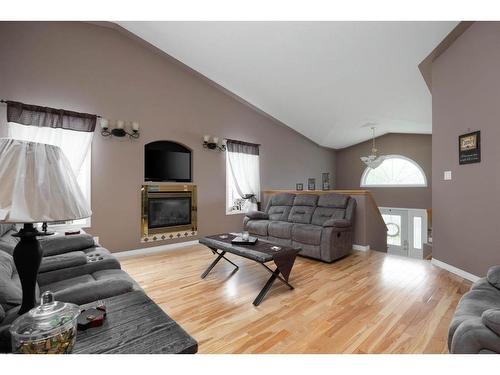 221 Waniandy Way, Fort Mcmurray, AB - Indoor Photo Showing Living Room With Fireplace