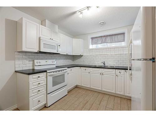 292 Starling Street, Fort Mcmurray, AB - Indoor Photo Showing Kitchen With Double Sink