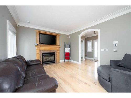 143 Laffont Way, Fort Mcmurray, AB - Indoor Photo Showing Living Room With Fireplace
