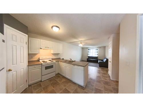 279 Mustang Road, Fort Mcmurray, AB - Indoor Photo Showing Kitchen With Double Sink