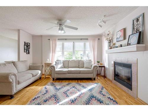 145 Brachett Crescent, Fort Mcmurray, AB - Indoor Photo Showing Living Room With Fireplace