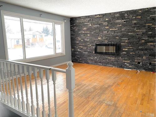 142 Caldwell Crescent, Fort Mcmurray, AB - Indoor With Fireplace