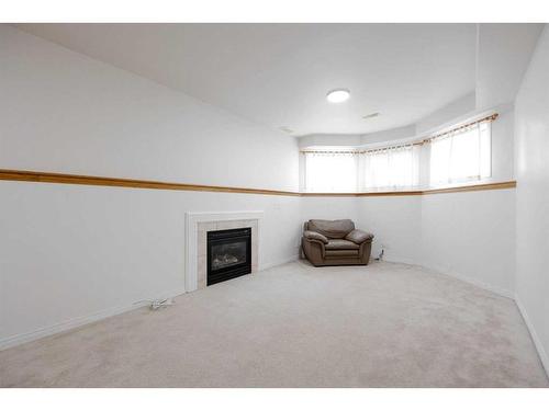 140 Waniandy Way, Fort Mcmurray, AB - Indoor Photo Showing Other Room With Fireplace