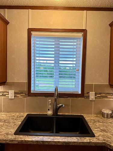 13561 654 Township, Rural Lac La Biche County, AB - Indoor Photo Showing Kitchen With Double Sink