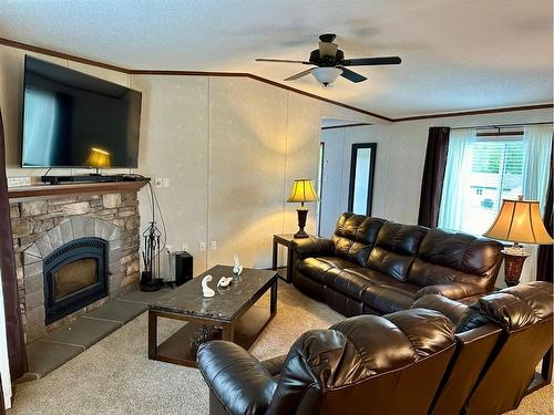 13561 654 Township, Rural Lac La Biche County, AB - Indoor Photo Showing Living Room With Fireplace