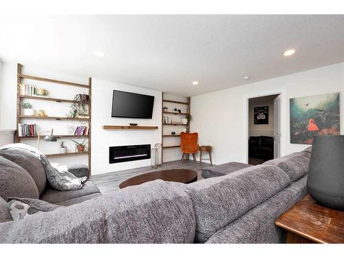 182 Leigh Crescent, Fort Mcmurray, AB - Indoor Photo Showing Living Room With Fireplace