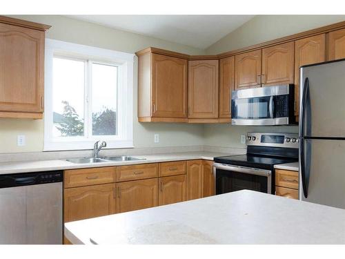 357 Diefenbaker Drive, Fort Mcmurray, AB - Indoor Photo Showing Kitchen With Stainless Steel Kitchen With Double Sink