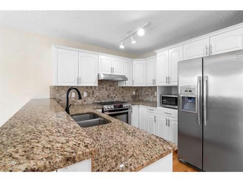 112 Brebeuf Crescent, Fort Mcmurray, AB - Indoor Photo Showing Kitchen With Double Sink With Upgraded Kitchen