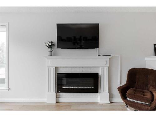 573 Timberline Drive, Fort Mcmurray, AB - Indoor Photo Showing Living Room With Fireplace