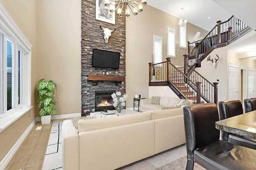 635 Heritage Drive, Fort Mcmurray, AB - Indoor Photo Showing Living Room With Fireplace