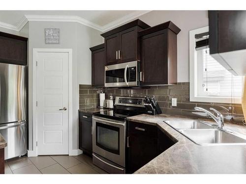 423 Killdeer Way, Fort Mcmurray, AB - Indoor Photo Showing Kitchen With Double Sink