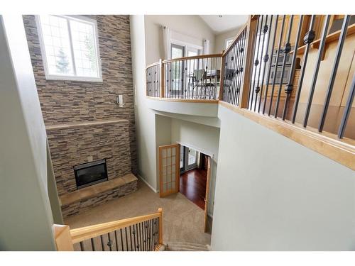 135 Lindstrom Crescent, Fort Mcmurray, AB - Indoor Photo Showing Other Room With Fireplace