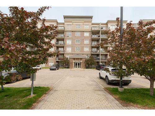 403-136C Sandpiper Road, Fort Mcmurray, AB - Outdoor With Balcony With Facade