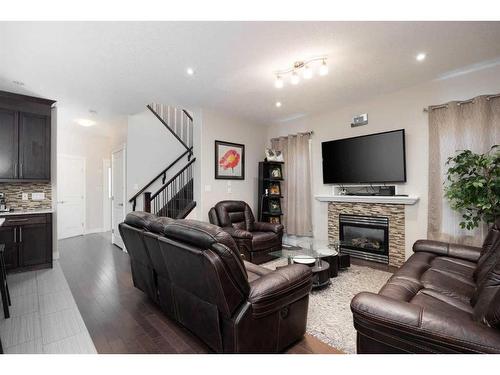 157 Coniker Crescent, Fort Mcmurray, AB - Indoor Photo Showing Living Room With Fireplace