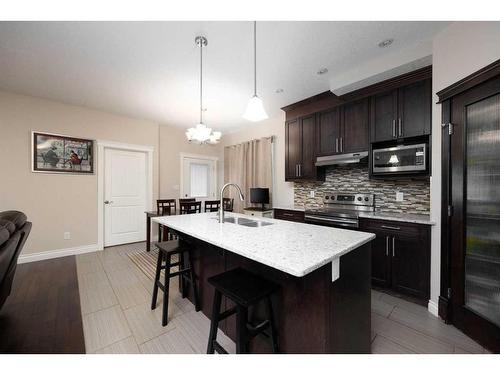 157 Coniker Crescent, Fort Mcmurray, AB - Indoor Photo Showing Kitchen With Double Sink With Upgraded Kitchen