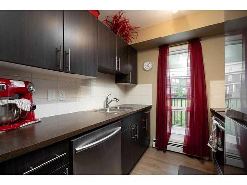 126-201 Abasand Drive, Fort Mcmurray, AB - Indoor Photo Showing Kitchen With Double Sink