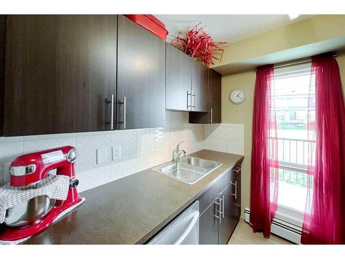 126-201 Abasand Drive, Fort Mcmurray, AB - Indoor Photo Showing Kitchen With Double Sink