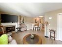 126-201 Abasand Drive, Fort Mcmurray, AB  - Indoor Photo Showing Living Room With Fireplace 