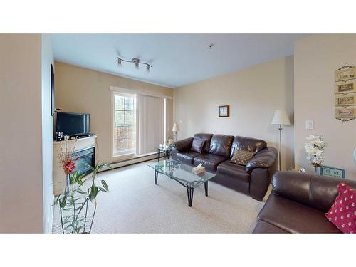 3206-200 Lougheed Drive, Fort Mcmurray, AB - Indoor Photo Showing Living Room