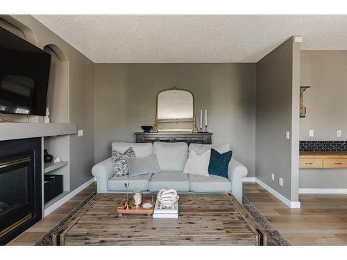 360 Diefenbaker Drive, Fort Mcmurray, AB - Indoor Photo Showing Living Room With Fireplace