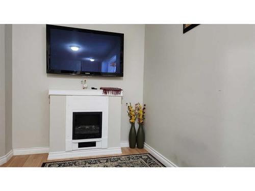 138 St. Laurent Way, Fort Mcmurray, AB - Indoor Photo Showing Living Room With Fireplace