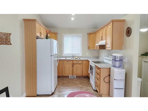 138 St. Laurent Way, Fort Mcmurray, AB - Indoor Photo Showing Kitchen With Double Sink