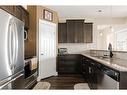 303-9919 Gordon Avenue, Fort Mcmurray, AB  - Indoor Photo Showing Kitchen With Stainless Steel Kitchen With Double Sink With Upgraded Kitchen 