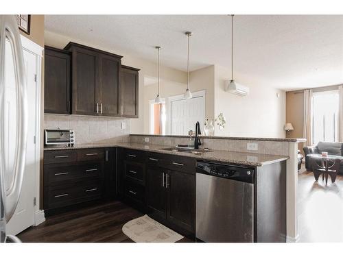 303-9919 Gordon Avenue, Fort Mcmurray, AB - Indoor Photo Showing Kitchen With Upgraded Kitchen