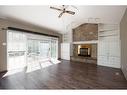 102 Silver Springs Drive, Fort Mcmurray, AB  - Indoor Photo Showing Living Room With Fireplace 