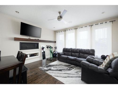 157 Ward Crescent, Fort Mcmurray, AB - Indoor Photo Showing Living Room With Fireplace