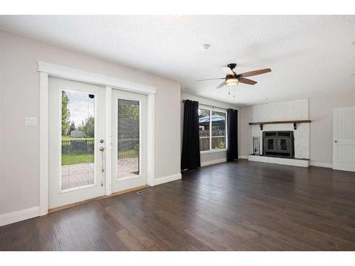 185 Berens Place, Fort Mcmurray, AB - Indoor Photo Showing Living Room With Fireplace