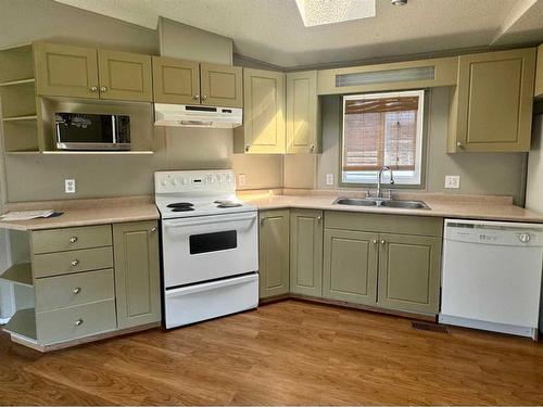 116 Mcinnes Street, Fort Mcmurray, AB - Indoor Photo Showing Kitchen With Double Sink