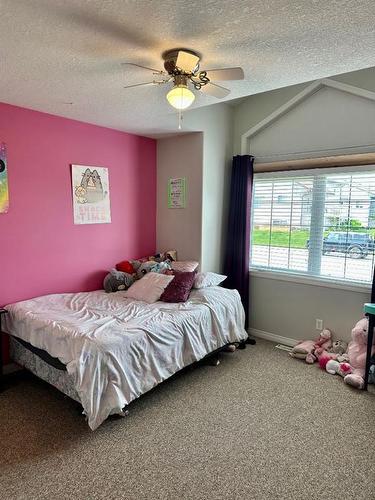 9221 91 Avenue, Lac La Biche, AB - Indoor Photo Showing Bedroom