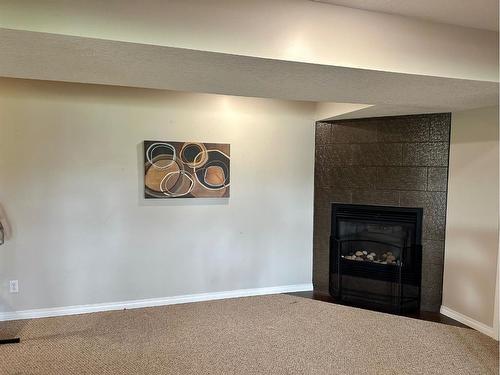 9221 91 Avenue, Lac La Biche, AB - Indoor With Fireplace