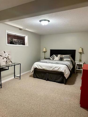 9221 91 Avenue, Lac La Biche, AB - Indoor Photo Showing Bedroom