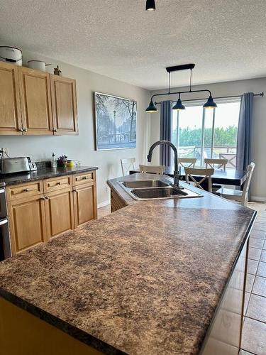 9221 91 Avenue, Lac La Biche, AB - Indoor Photo Showing Kitchen With Double Sink