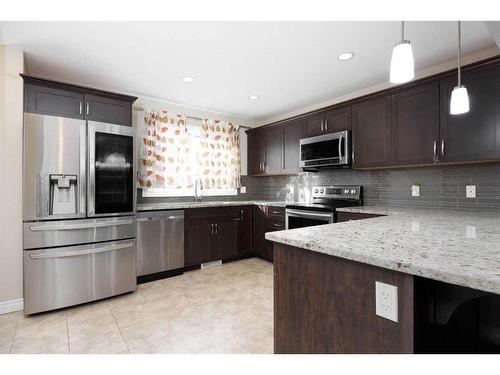 240 Comeau Crescent, Fort Mcmurray, AB - Indoor Photo Showing Kitchen With Stainless Steel Kitchen With Upgraded Kitchen