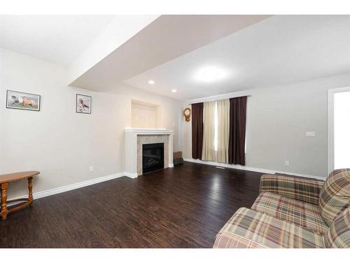 240 Comeau Crescent, Fort Mcmurray, AB - Indoor Photo Showing Other Room With Fireplace