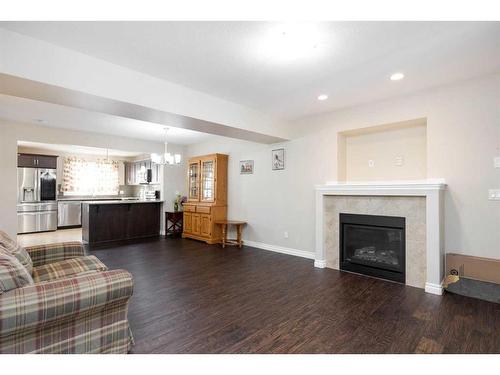 240 Comeau Crescent, Fort Mcmurray, AB - Indoor Photo Showing Living Room With Fireplace