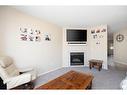 237 Kodiak Crescent, Fort Mcmurray, AB  - Indoor Photo Showing Living Room With Fireplace 