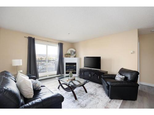 342-200 Richard Street, Fort Mcmurray, AB - Indoor Photo Showing Living Room With Fireplace