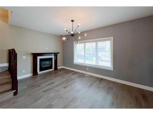 121 Huberman Way, Fort Mcmurray, AB - Indoor Photo Showing Living Room With Fireplace