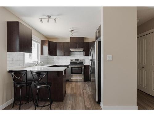 95-401 Athabasca Avenue, Fort Mcmurray, AB - Indoor Photo Showing Kitchen With Stainless Steel Kitchen With Double Sink With Upgraded Kitchen