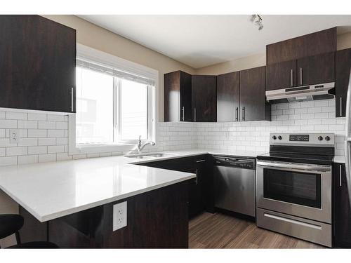 95-401 Athabasca Avenue, Fort Mcmurray, AB - Indoor Photo Showing Kitchen With Stainless Steel Kitchen With Upgraded Kitchen