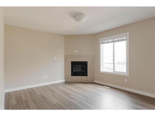 95-401 Athabasca Avenue, Fort Mcmurray, AB - Indoor Photo Showing Living Room With Fireplace