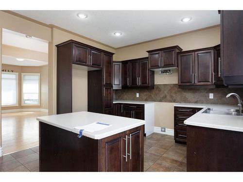 108 Wild Rose Street, Fort Mcmurray, AB - Indoor Photo Showing Kitchen With Double Sink
