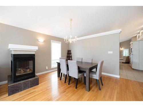 149 Tundra Drive, Fort Mcmurray, AB - Indoor Photo Showing Dining Room With Fireplace