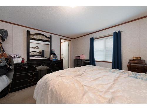 144 Grey Owl Place, Fort Mcmurray, AB - Indoor Photo Showing Bedroom