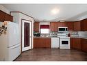 144 Grey Owl Place, Fort Mcmurray, AB  - Indoor Photo Showing Kitchen With Double Sink 